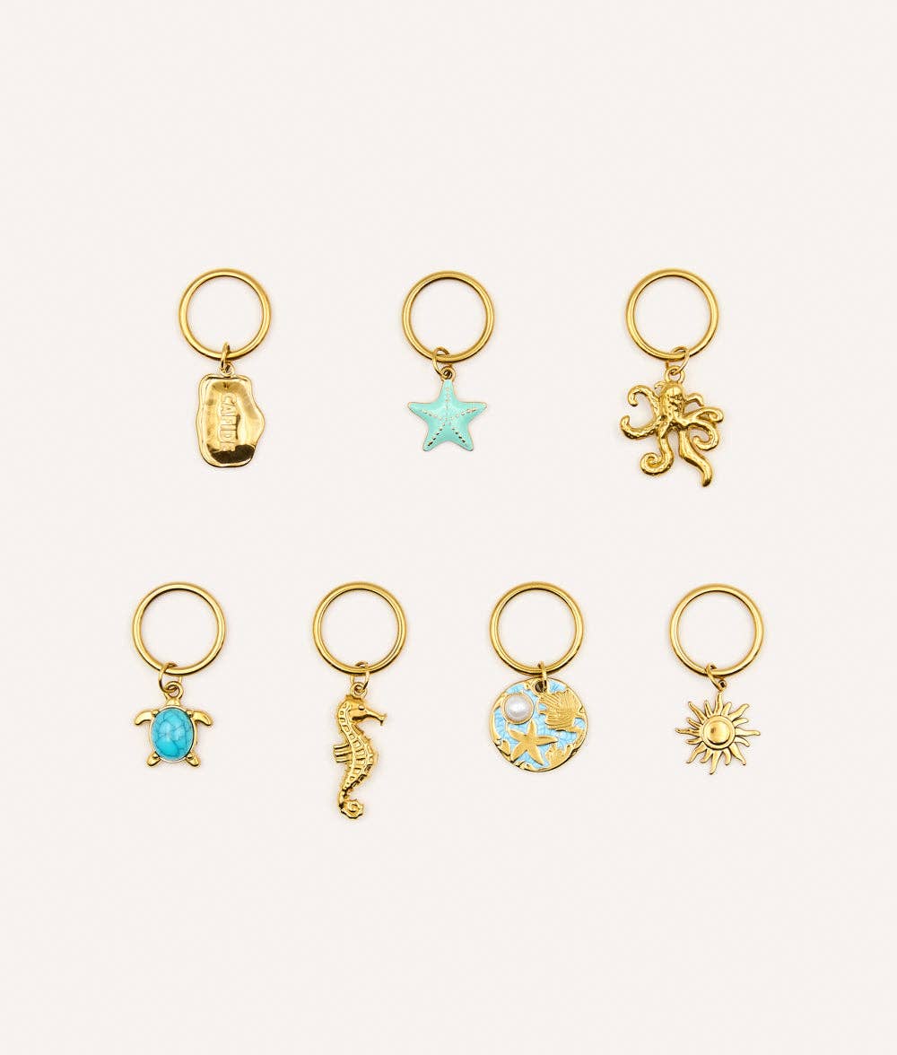 Sira Charms - Set van 7 hondenbedels.